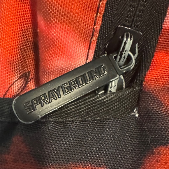 Sprayground Red and Black Tie-Dye Backpack with White Symbol - Picture 5 of 12
